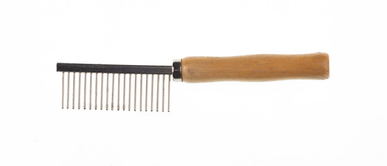 vintage metal hair comb with wooden handle isolated on white background