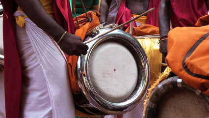 In a festival celebration, artists playing Thavil, a South Indian percussion musical instrument
