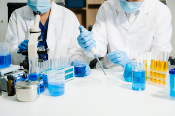 Closeup scientist science research biology chemistry chemical experiment microscope virus flask dna...