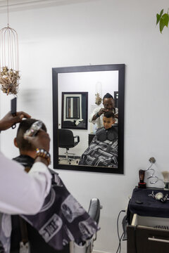 Young boy having a haircut