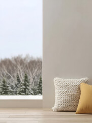 Cozy indoor corner with cushions and winter view through large window