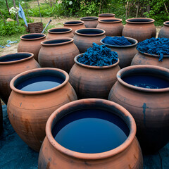 Indigo Dyeing Pots Outdoor Photo Demonstrating Color And Traditional Process
