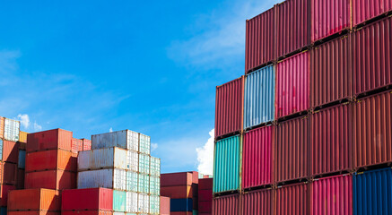 Fototapeta premium Cargo ship container goods export import international transport on blue sky background, warehouse industry business logistics transportation harbor port industrial shipping terminal cargo ship.