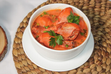 A bowl of spicy chicken soup. delicious chicken soup dishes