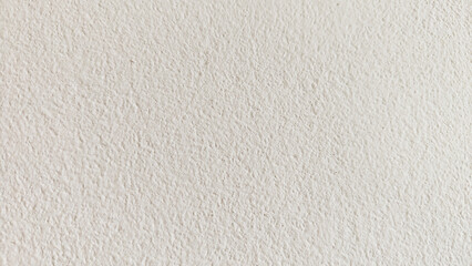 Close-Up of White Painted Textured Wall Surface Minimalist Background with Rough Plaster Finish