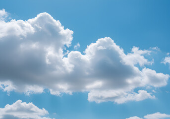Obraz premium Photo of Puffy Clouds in a Bright Blue Sky Airy Cloudscape