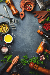 Black food background. Vegetables and spices on black background. Top view. Free space for your text.