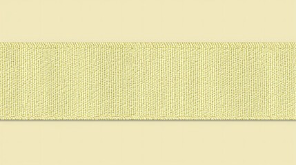 Fototapeta premium Pale yellow textured fabric ribbon strip on a soft background layout