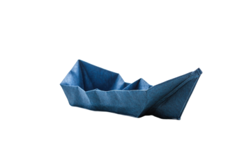 A blue origami paper boat