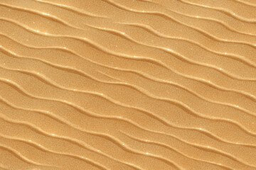 Golden Sand Texture with Wave Pattern Background