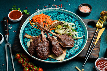 Juicy grilled venison steak on the bone. Meat barbecue menu. Free space for text. Close up.