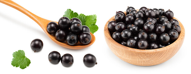 black currant in wooden bowl isolated on white background. macro. clipping path