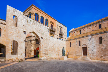 Naklejka premium Bari, Italy. Portico dei Pellegrini in San Nicola Square, historic downtown around the famous basilica