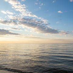 Obraz premium Serene Ocean View Golden Light Water Meets Sky Coastal Photo