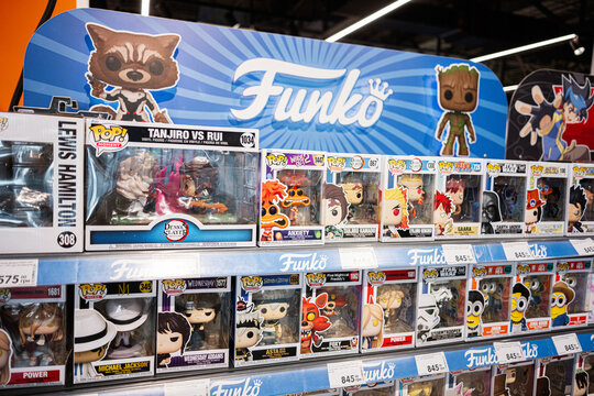 Colorful assortment of Funko Pop figurine boxes in a retail store display