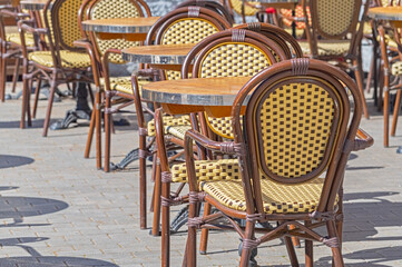 chairs and tables in the summer cafe