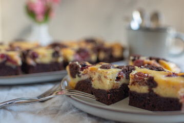 Chocolate cheesecake layered with brownie and dark cherrie