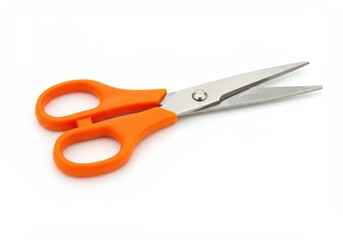 Open scissors with orange handles lying on a white surface, ready for cutting and crafting projects