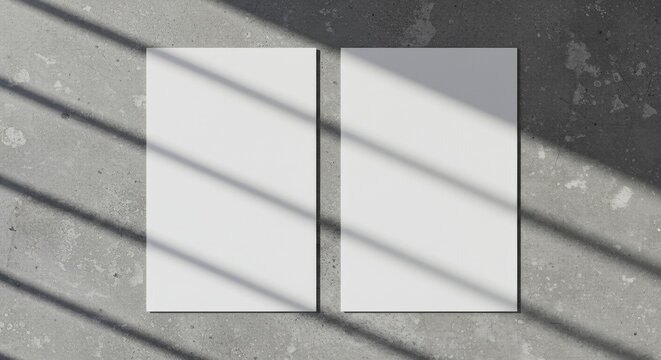 Two White Rectangle Mockups on Gray Concrete Surface with Shadows