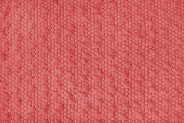 Texture of red carpet fabric with large coarse textured weaving. Surface, structure of upholstery or rug material, cloth background close up, macro.