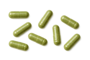 Green capsules scattered on a black surface, likely containing herbal or dietary supplements. Concept Herbal Supplements, Dietary Health, Natural Ingredients, Capsule Design, Product Photography