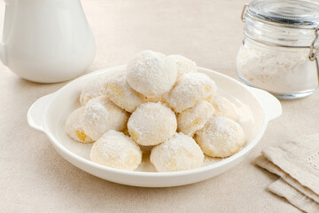 Kue Putri Salju or Snow White Cookies. Made from flour, sugar and butter coated with powdered sugar. 
