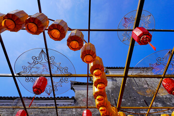 Traditional Lanterns Against a Clear Sky