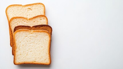 Fresh slices of bread are arranged attractively, showcasing different toasting levels. Perfect for a variety of uses, from sandwiches to toast or croutons.