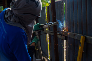 A steel welder in the house's wall had sparks.