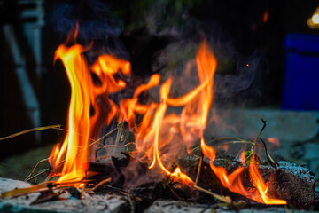 Bonfire makes fire, black background