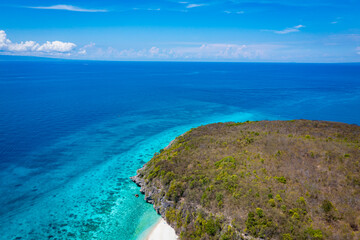 The summer vacation background with Nature panorama horizon as sea of blue water in summer tropical beach with blue sky