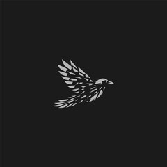 Flying crow logo with fragmented feather silhouette style.
