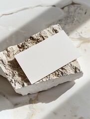 Clean White Business Card Mockup On Rough Stone With Marble Background Photo