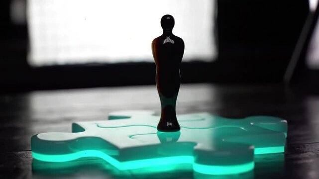 The Missing Piece: A Figurine Stands on a Glowing Puzzle Piece, Symbolizing Completion, Unity, or Finding One's Place.