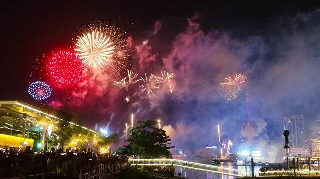 Fireworks display to celebrate the 50th anniversary of Vietnam's reunification. Beautiful night view cityscape. Holidays, independence day, New Year