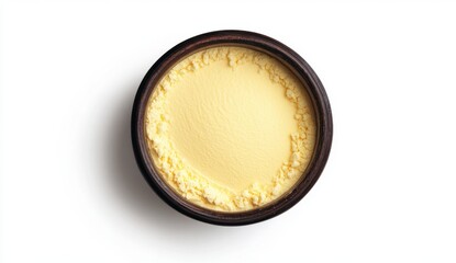 Creamy Yellow Butter in Wooden Bowl on White Background