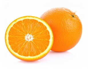 Golden Citrus Burst: A vibrant close-up showcases the zesty allure of an orange, revealing its juicy interior alongside its textured peel, embodying freshness and vitamin-rich goodness.