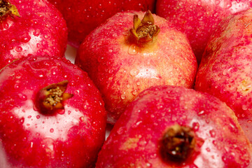 closeup of ripe organic pomegranates
