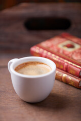 Cup of coffee on wooden background. Soft focus. Copy space	