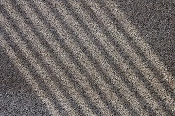 Soft light and shadows on simple textured walls.