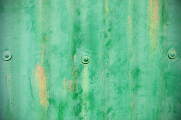Weathered green corrugated sheeting background