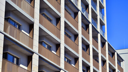 Obraz premium Modern new residential apartment house building complex. Exterior view of modern apartment building. New construction apartment or condo complex.