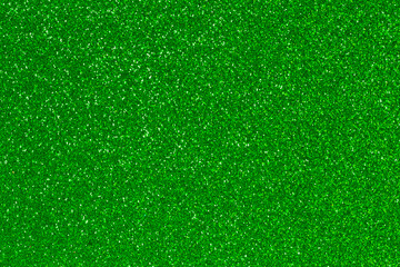 green color backdrop: close up of shiny glitter texture