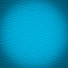 close up of blue striped cardboard background with shadowed edge
