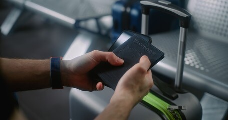 International Airport Terminal: Close Up of Passenger with Luggage Sitting in Departure Lounge of...