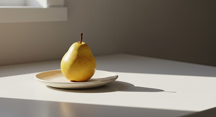 Yellow pear on plate still life
