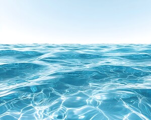 Serene ocean surface with gentle waves and clear turquoise water under a bright sky