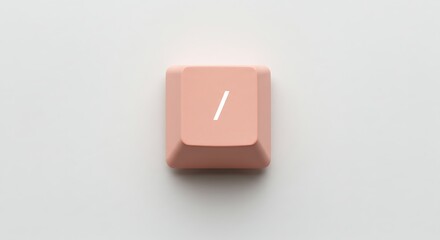 Close-up of a single peach-colored keyboard key with a slash symbol