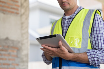 Construction site, housing estate and construction engineer working, planning, inspecting structure of architecture in construction site. Hands checking estate projects under construction