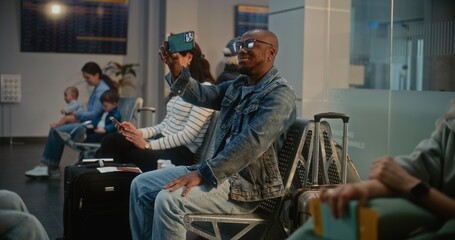 Crowded International Airport Terminal: African American Man Talking by Video Chat, Filming Video...